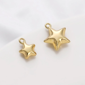 Pair of polished 14K gold-filled star charms in two sizes for DIY jewelry making