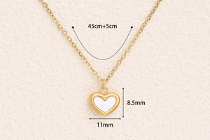 Detailed view of gold heart necklace pendant dimensions 11mm x 8.5mm with 45cm chain