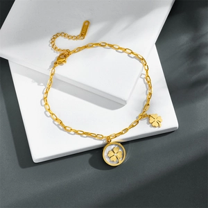 Elegant gold titanium steel clover bracelet with white shell inlay and lobster clasp