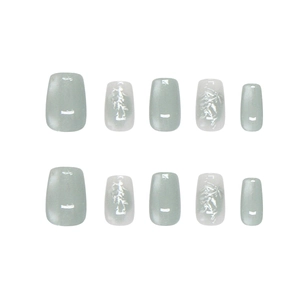 Handmade light green moonstone cat eye press-on nails with silver leaf foil decorations