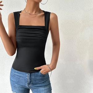 Detail of black square neck ribbed knit tank top featuring stylish front ruching design