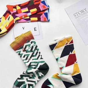 Detail of colorful geometric pattern cotton socks in a French oil painting style