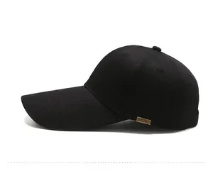 Side view of black baseball cap showing the SPORT metal plate on twill fabric