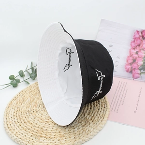 Double-sided cotton bucket hat with 'something' embroidery and gesture logo on a woven mat