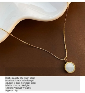 Close-up of 18K gold-plated titanium steel necklace with white mother-of-pearl pendant