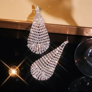 Luxury silver tassel drop earrings with sparkling rhinestones for evening party wear