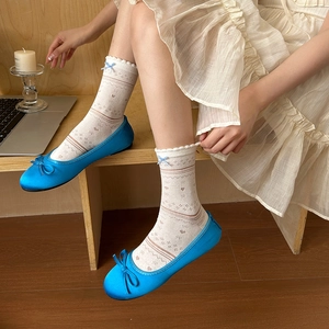 Lace hollow mesh crew socks with bow detail and heart pattern in white and blue