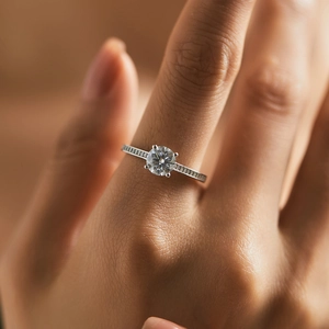 Luxury S925 sterling silver moissanite ring with a round center stone and paved band