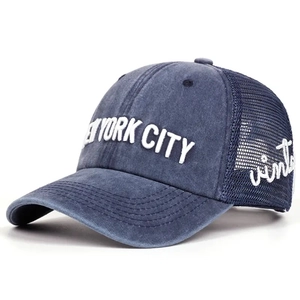 Detailed embroidery of NEW YORK CITY on vintage blue breathable mesh trucker hat