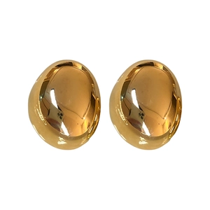 Polished gold plated geometric oval bean stud earrings with a minimalist sleek design