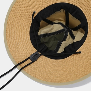 Adjustable wide brim straw sun hat featuring a quick-dry patchwork lining and windproof cord