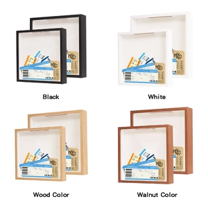 Four colors of wooden ticket shadow boxes in black white wood and walnut finishes