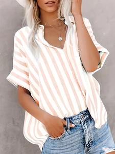 Close-up of women's short-sleeve shirt with beige vertical stripes and V-neckline detail