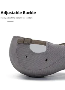 Detail of grey striped flat cap with adjustable brown strap and metal buckle closure
