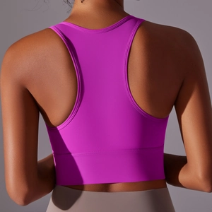 Detail of a purple racerback sports bra showing supportive high-elastic fabric and slim fit