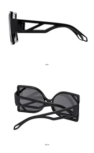 Detail view showing hollow geometric temple design of cat eye sunglasses from side and back