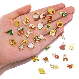 Christmas enamel charms collection with santa, tree and snowman in a palm for DIY jewelry