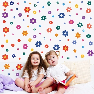 Colorful floral wall stickers in kids bedroom with soft minimalist flower patterns
