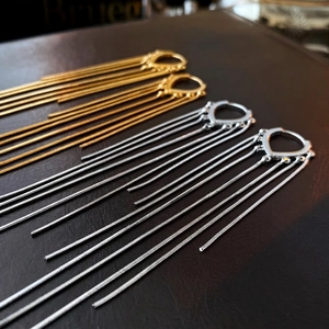 Élégantes boucles d'oreilles pendantes à longs gland en plaqué or et argent brillant