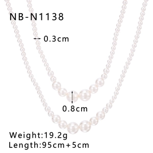 Detail showing pearl size 0.3cm and 0.8cm on 18K gold plated stainless steel necklace