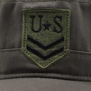 Detailed embroidery on military-style cotton cadet cap with star and chevron emblem