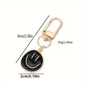 Mini creative smiley face keychain with irregular smile pendant and lobster clasp