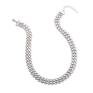 Detailed view of silver woven chain necklace with lobster clasp and adjustable extension