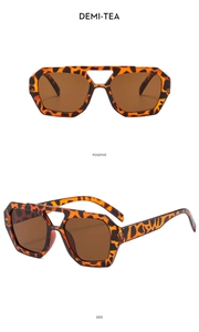 Detail view of double bridge aviator sunglasses with tortoise frame and demi-tea lenses