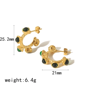 Elegant C-shaped gold pearl earrings with green stone and irregular lava texture