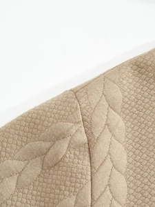 Detailed view of khaki quilted texture and premium stitching on the casual hoodie