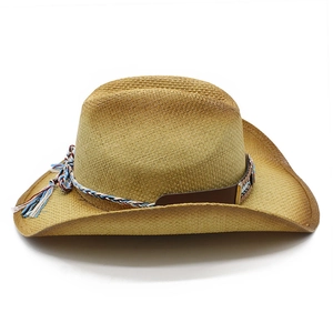 Classic Western straw cowboy hat with colorful braided band on a white background