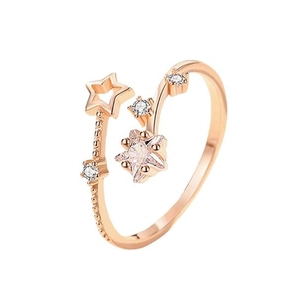 Adjustable rose gold star ring with cubic zirconia stones and open band design