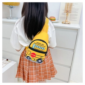 Rear view of a child wearing a cute yellow school bus chest bag with stop sign print