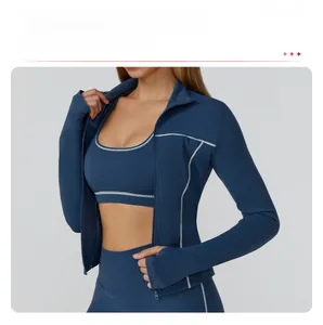 Detail of slim fit yoga jacket with stand collar, full zipper and thumbhole cuffs