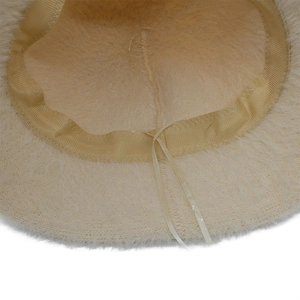 Detail of the soft faux mink fur bucket hat interior with adjustable inner drawstring