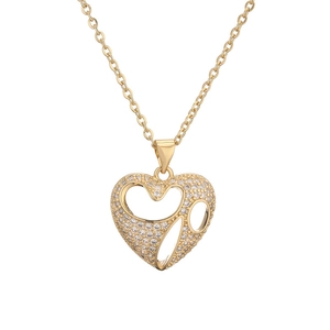 Elegant gold plated hollow heart pendant necklace with shimmering zircon stones on white background