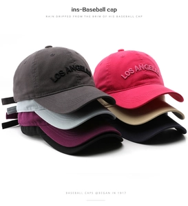 Detail of Los Angeles embroidery on multi-color washed cotton baseball caps