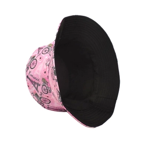 Close-up of pink bucket hat with Paris romance prints and black inner lining