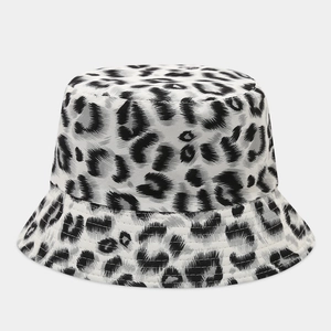 Detail of the black and white leopard print and fine stitching on a bucket hat