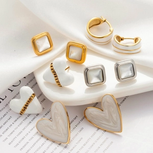 Minimalist stainless steel earrings set with enamel hearts and mother of pearl accents
