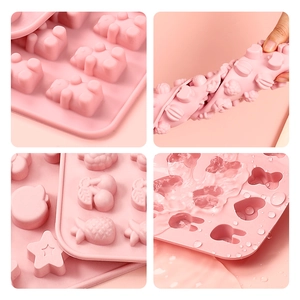 Pink flexible silicone mold with animal and fruit shapes for DIY candy or ice cube making