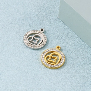 Polished gold and silver circular pendants with hollow heart pattern and pavé crystals