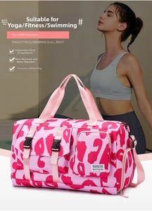 Detail of pink cow print gym bag featuring dry wet separation and shoe compartment