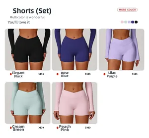 Detail of high-waist criss-cross yoga shorts in black, blue, purple, green, and pink