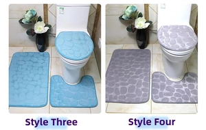 Detailed view of sky blue cobble embossed bath mat set with U-shaped toilet rug