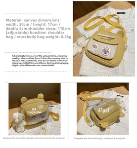 Detailed spec view of small canvas crossbody bag with bear ears showing 20x17x6cm size