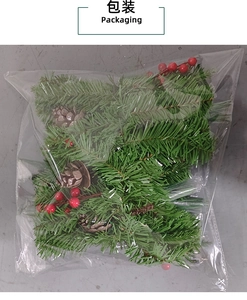 Detailed view of Christmas pine needle, cone, and berry decoration sets in bulk packaging