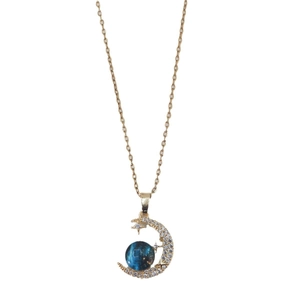 Celestial gold moon pendant necklace with navy blue star orb and sparkling crystals
