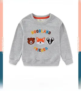 Detailed view of colorful forest animal embroidery on grey long sleeve cotton sweatshirt