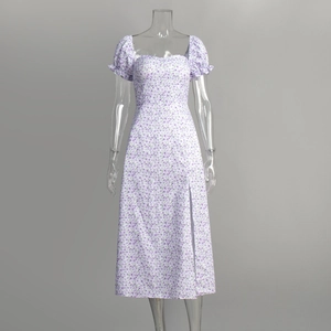 Detail of square neckline and puff sleeves on white floral maxi dress with side split